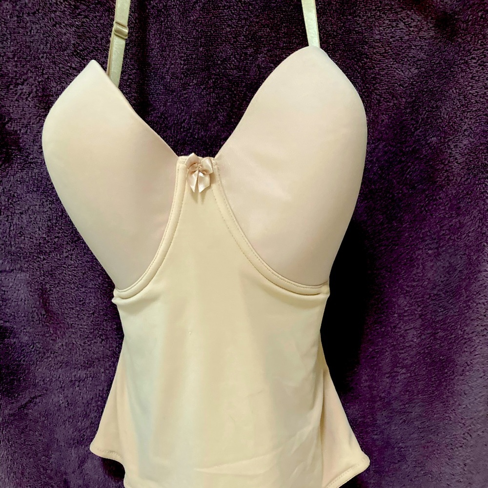 Long line strapless bustier with removable neck straps and stocking straps.